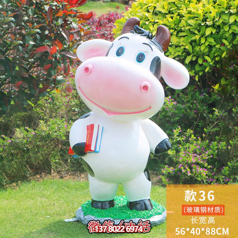 圖書(shū)館一只拿書(shū)的玻璃鋼牛雕塑 圖書(shū)館一只拿書(shū)的玻璃鋼牛雕塑